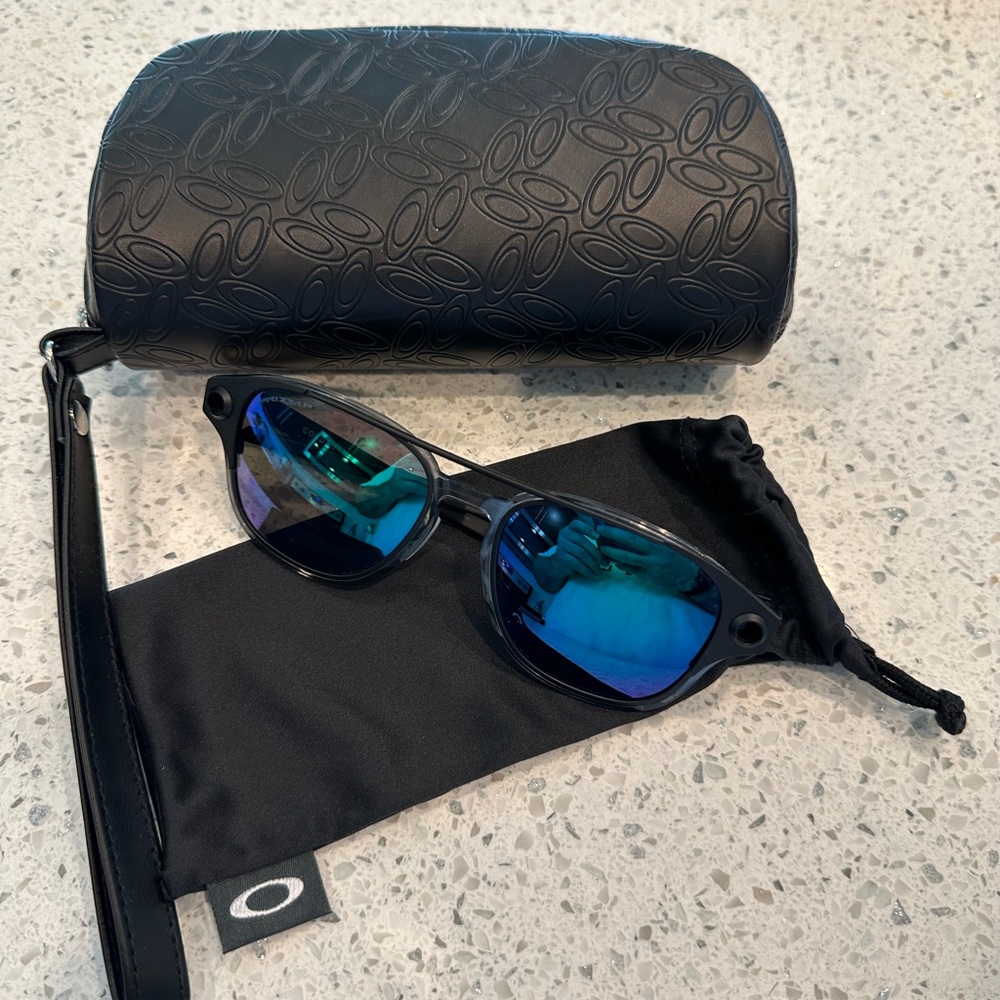 Oakley Coldfuse Titanium sunglasses Matte Black, Jade Prism Polarized lenses
